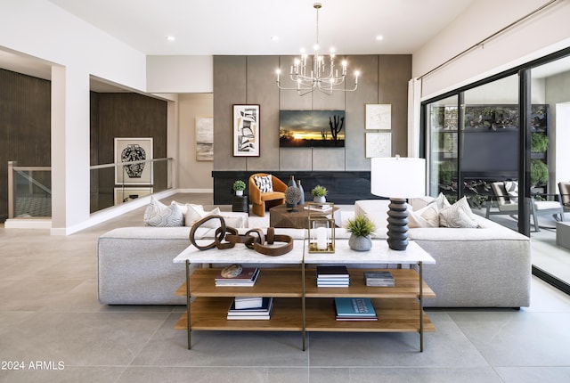 living room featuring a notable chandelier and recessed lighting