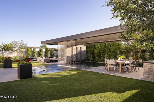 exterior space featuring outdoor lounge area and a patio