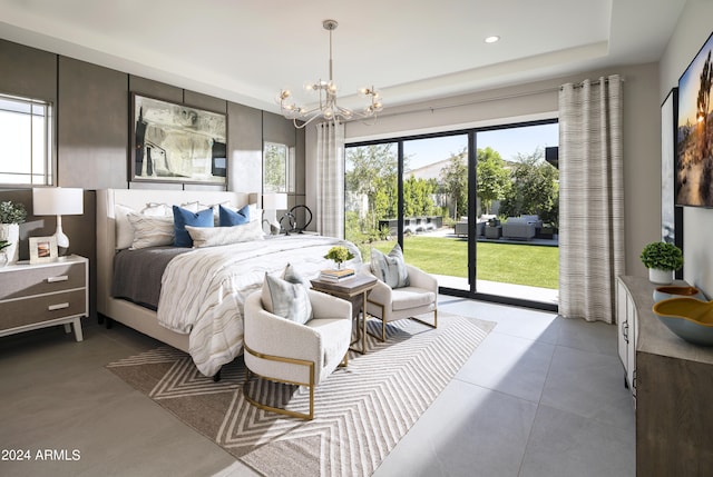 bedroom with an inviting chandelier, access to exterior, and recessed lighting