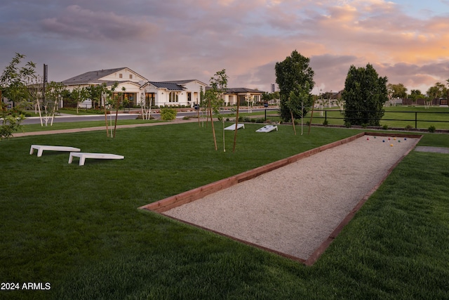 view of community with a lawn and a residential view