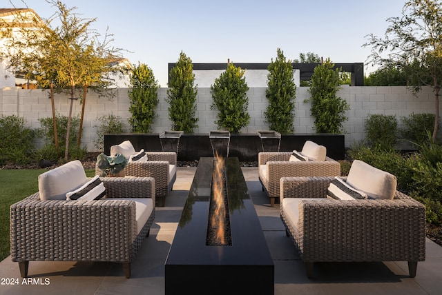 view of patio / terrace featuring fence and an outdoor hangout area