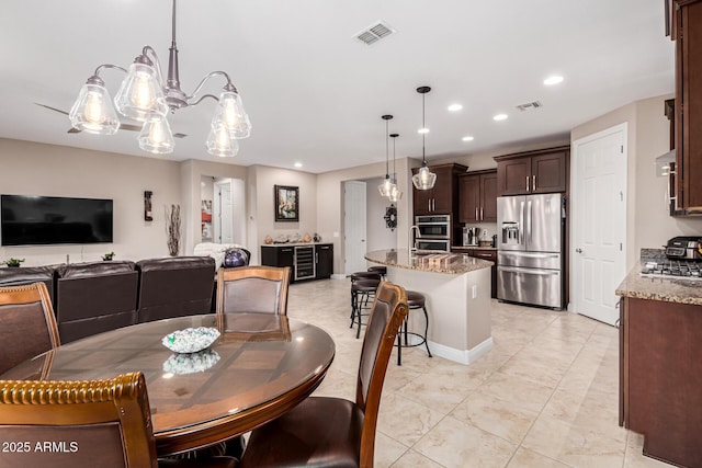 dining area with light tile patterned flooring