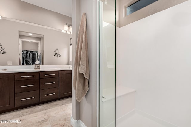 bathroom featuring vanity and walk in shower