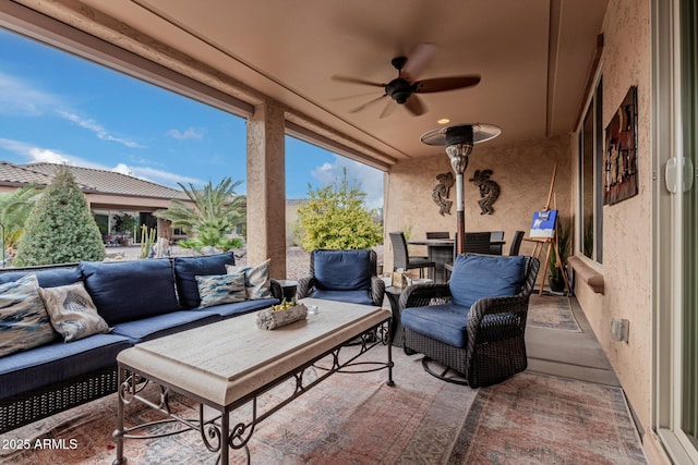 view of patio featuring an outdoor living space and ceiling fan