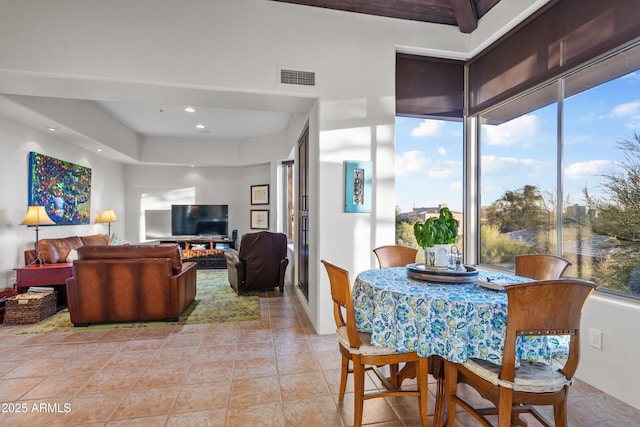 dining area with light tile patterned floors, visible vents, and recessed lighting