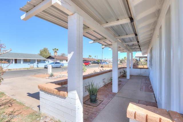 view of patio / terrace with a residential view