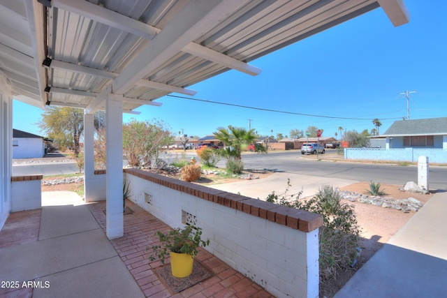 view of patio featuring a porch