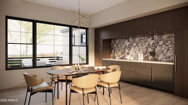 dining area with light wood-type flooring