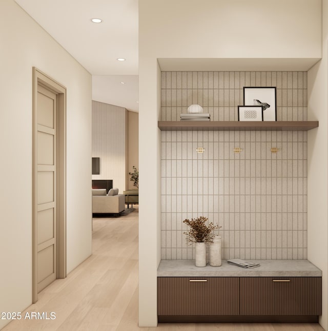 mudroom with light wood-type flooring