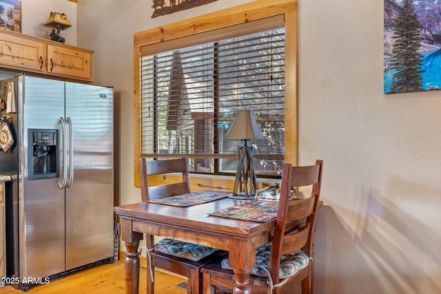 dining room with light wood-type flooring