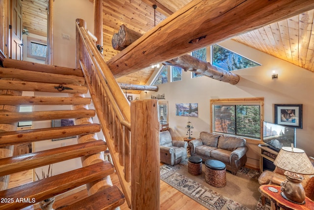 interior space with hardwood / wood-style flooring, beam ceiling, wooden ceiling, and high vaulted ceiling