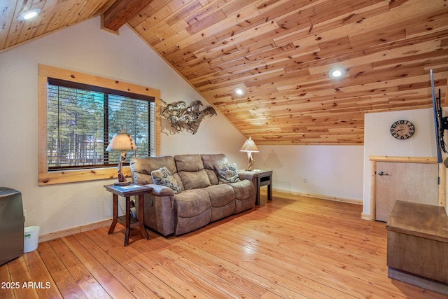 living room with lofted ceiling with beams, wood ceiling, and light hardwood / wood-style flooring