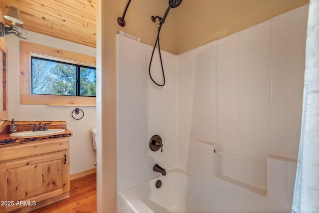 bathroom featuring shower / bath combo, vanity, and wood-type flooring