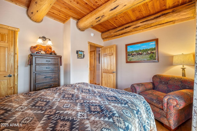 bedroom featuring beam ceiling and wood ceiling