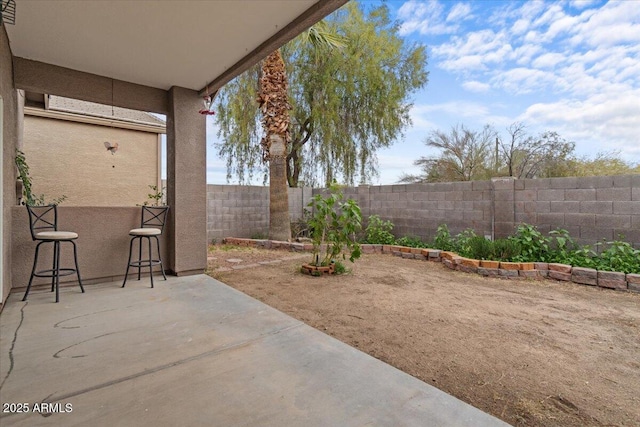 view of patio featuring a fenced backyard