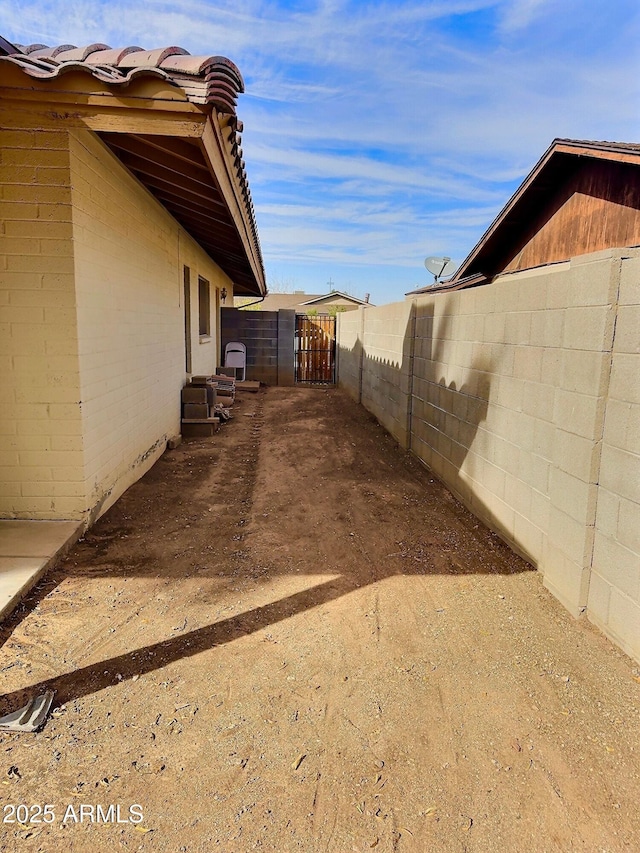 view of yard with fence