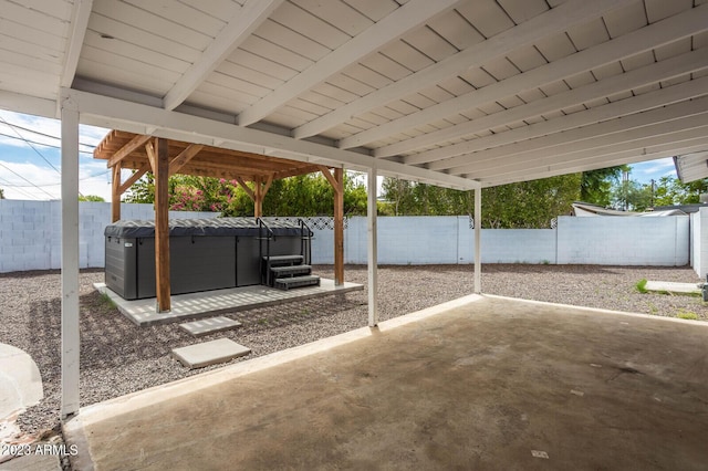 view of patio / terrace featuring a hot tub