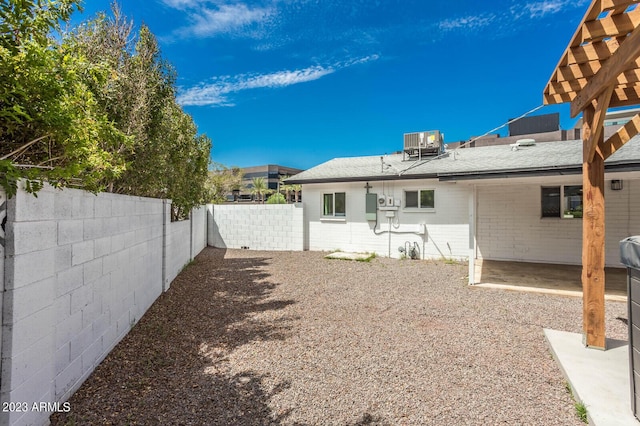 view of yard featuring central AC