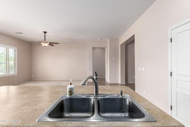 18072 W Paradise Ln, Surprise, AZ 85388 - kitchen featuring a ceiling fan and a sink