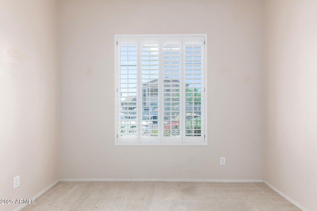 18072 W Paradise Ln, Surprise, AZ 85388 - empty room with carpet flooring and baseboards