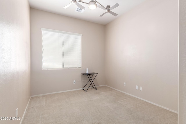 18072 W Paradise Ln, Surprise, AZ 85388 - spare room with visible vents, a ceiling fan, carpet, and baseboards