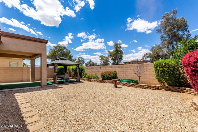 18072 W Paradise Ln, Surprise, AZ 85388 - view of yard featuring a gazebo, a fenced backyard, and a patio