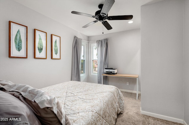 bedroom with ceiling fan and carpet