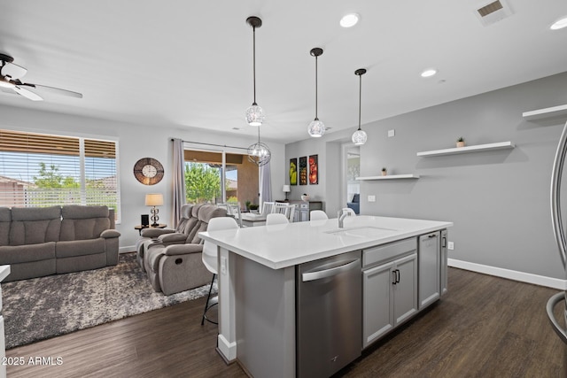14573 W Reade Ave, Litchfield Park, AZ 85340 - kitchen with dishwasher, open floor plan, dark wood-type flooring, and recessed lighting