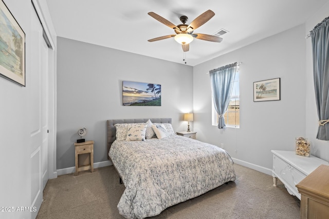 14573 W Reade Ave, Litchfield Park, AZ 85340 - bedroom featuring a closet, light colored carpet, and ceiling fan