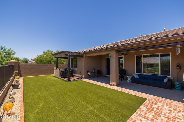 14573 W Reade Ave, Litchfield Park, AZ 85340 - fenced backyard featuring ceiling fan and a patio