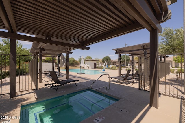 14573 W Reade Ave, Litchfield Park, AZ 85340 - community pool featuring a hot tub and a patio