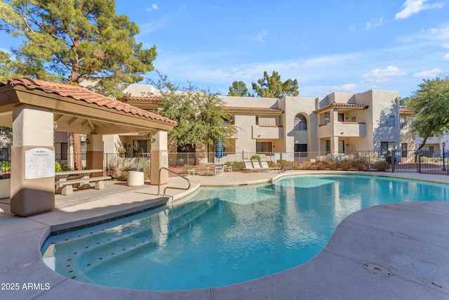 view of swimming pool featuring a patio