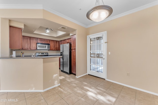 kitchen with kitchen peninsula, a raised ceiling, light tile patterned floors, and stainless steel appliances