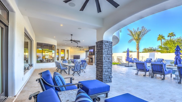 view of patio / terrace featuring an outdoor hangout area and ceiling fan