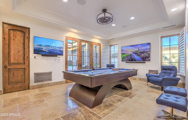 playroom featuring a raised ceiling, pool table, and french doors