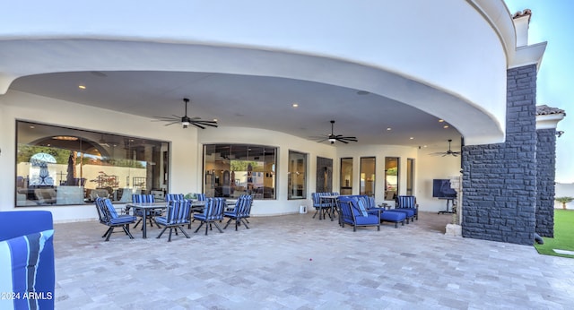 view of patio featuring ceiling fan and an outdoor hangout area