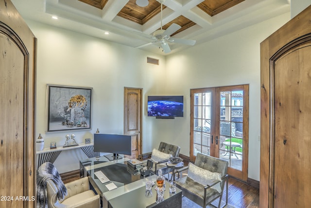 office space featuring french doors, dark hardwood / wood-style flooring, coffered ceiling, beamed ceiling, and ceiling fan