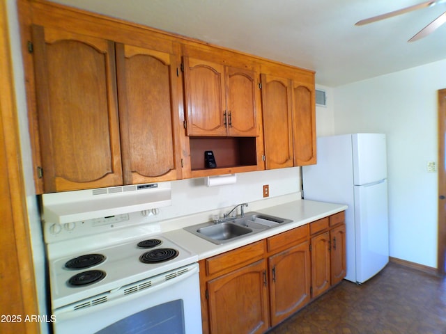 211 W Kiser St, Superior, AZ 85173 - kitchen with ceiling fan, white appliances, and sink