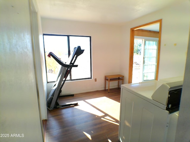 211 W Kiser St, Superior, AZ 85173 - workout area with dark wood-type flooring and washer / clothes dryer