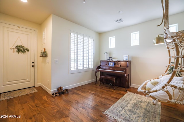 foyer with dark wood-type flooring