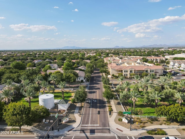 birds eye view of property featuring a mountain view