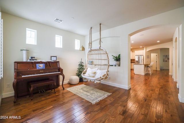 sitting room with dark hardwood / wood-style floors