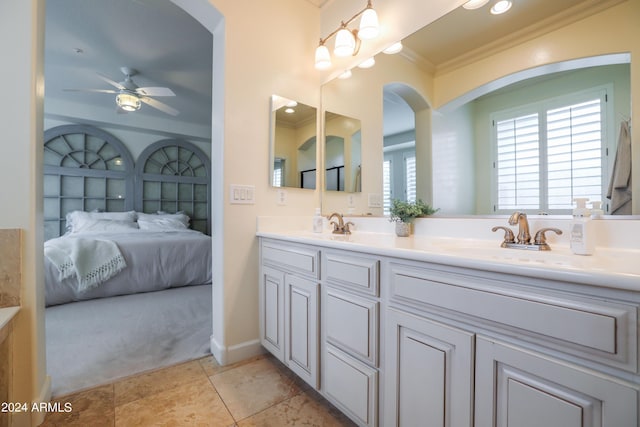 bathroom with ornamental molding, tile patterned floors, vanity, and ceiling fan