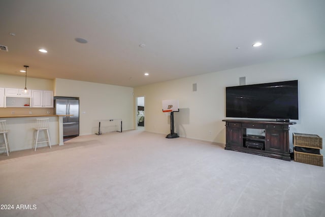 living room featuring light colored carpet