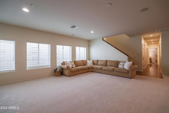 unfurnished living room featuring carpet floors