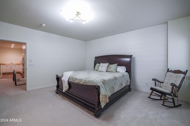 bedroom with light colored carpet