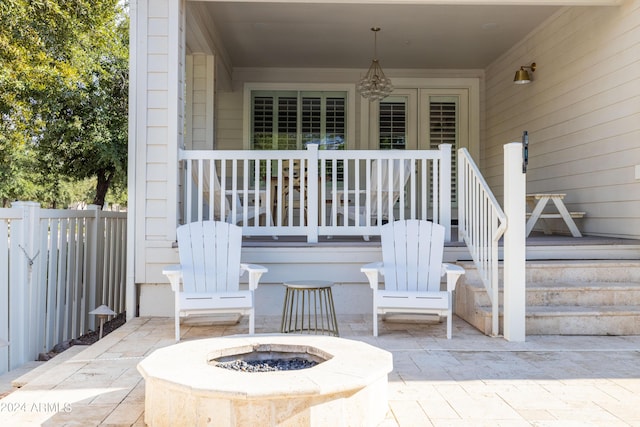 view of patio / terrace featuring an outdoor fire pit