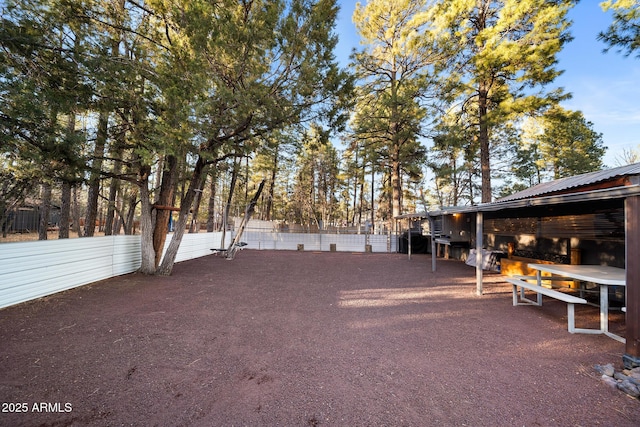 view of yard featuring a fenced backyard