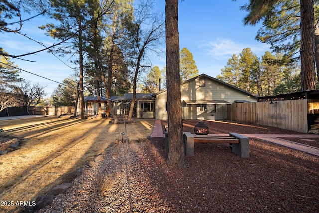 exterior space featuring a patio and fence