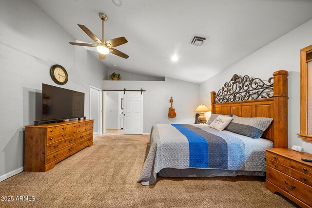 carpeted bedroom featuring visible vents, baseboards, a barn door, high vaulted ceiling, and a ceiling fan